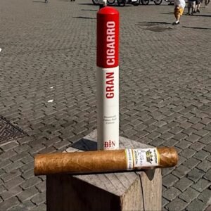 Oversized Gran Cigarro sign next to a real cigar.